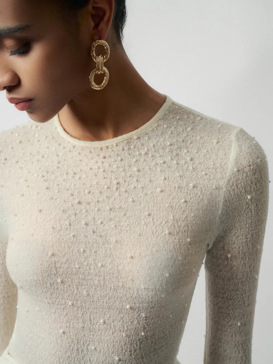 Ari Wool Lacy Jacquard Embroidered Top in White — original WHITE ANT photograph