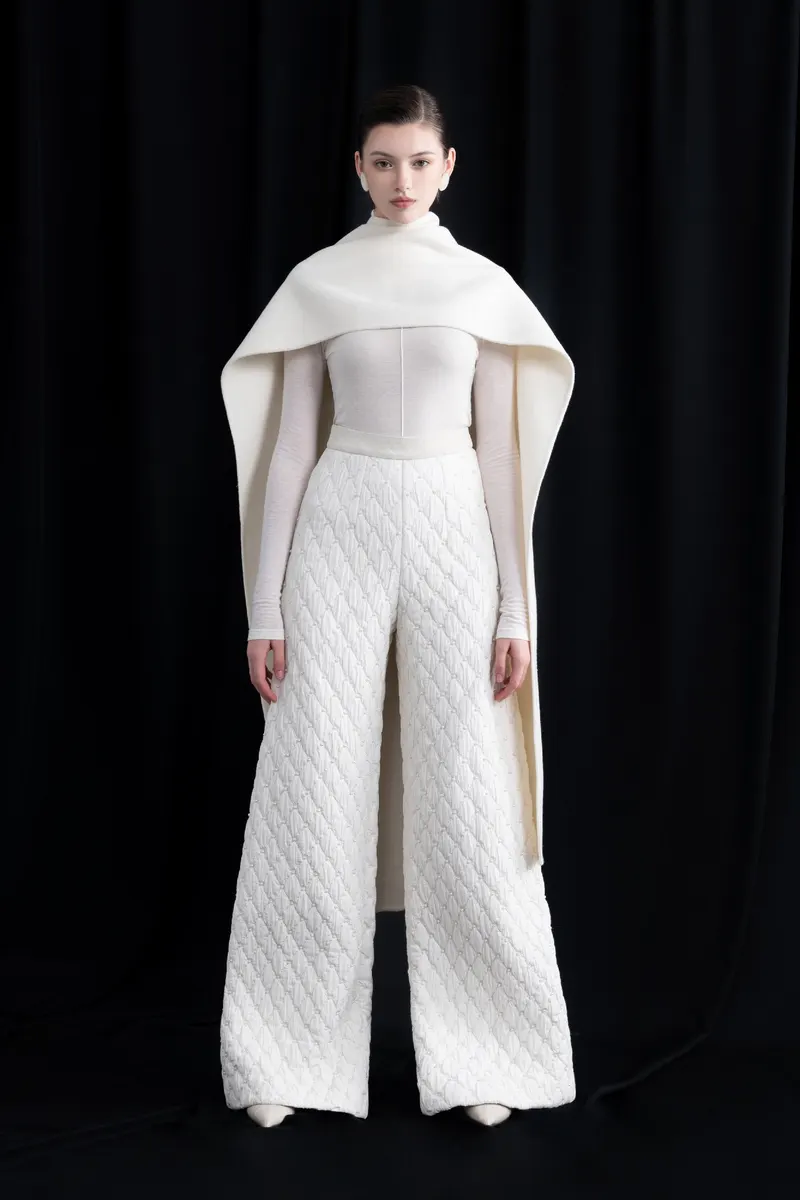 Mid Rise Wide Leg Pants in White — original WHITE ANT photograph