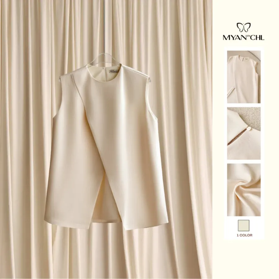 Relaxed Sleeveless Top with Asymmetric Hem in Cream