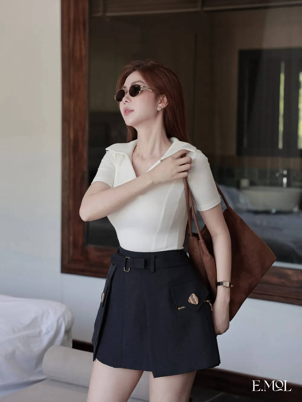Raw Skirt with Attached Belt Pocket Design — original E.MOL photograph 1