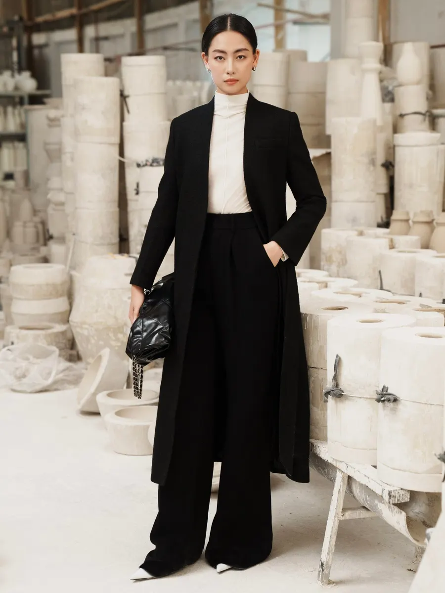 Naamah Coats in Black — original WHITE ANT photograph